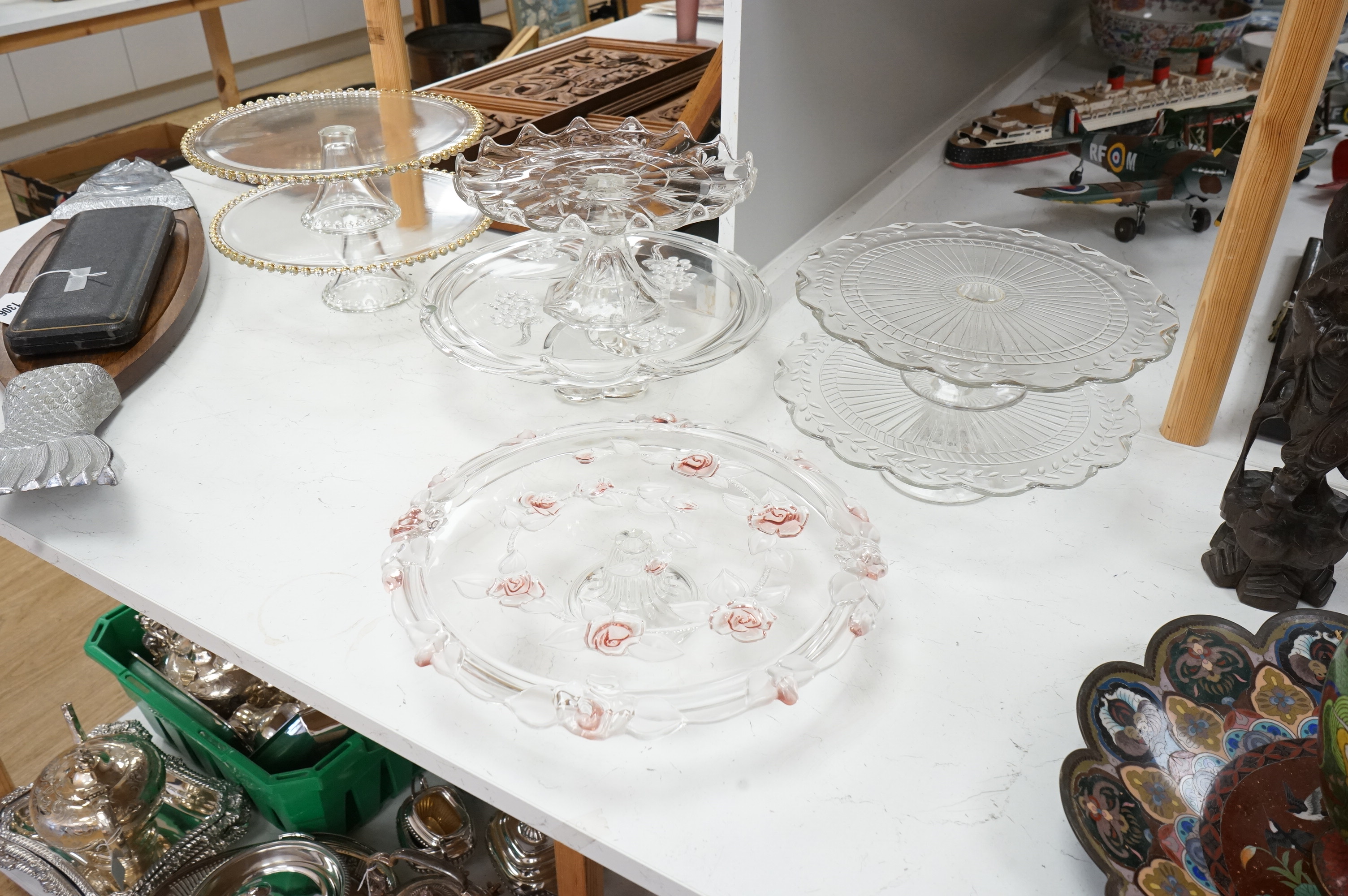 Seven decorative 20th century glass cake tazza, largest 36cm diameter